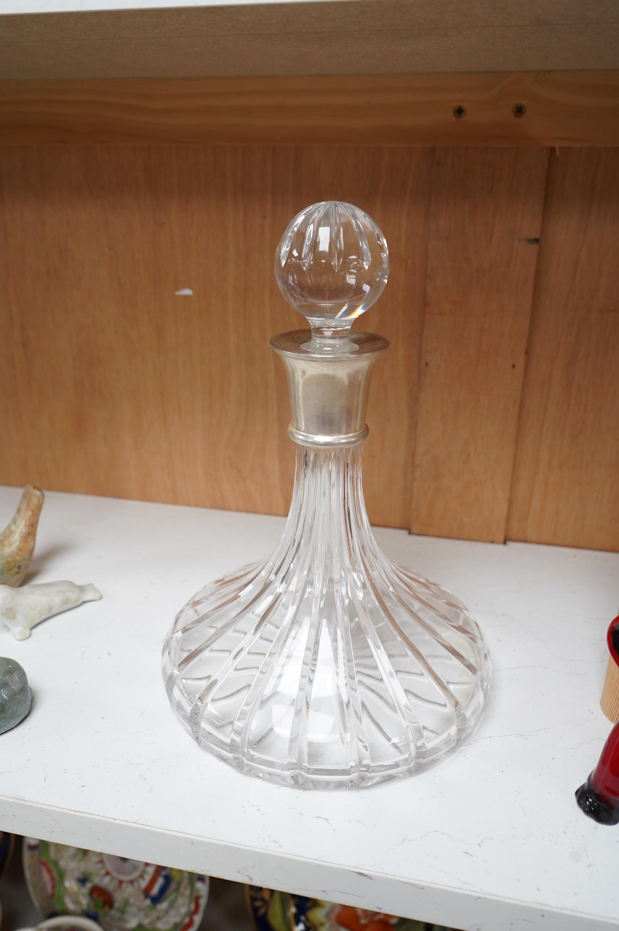 A silver mounted decanter, hallmarked for Sheffield, 2000, 27cm high